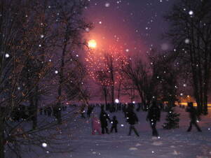 People enjoying an evening in the snow